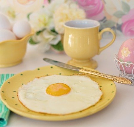 A fried egg around other Easter decorations