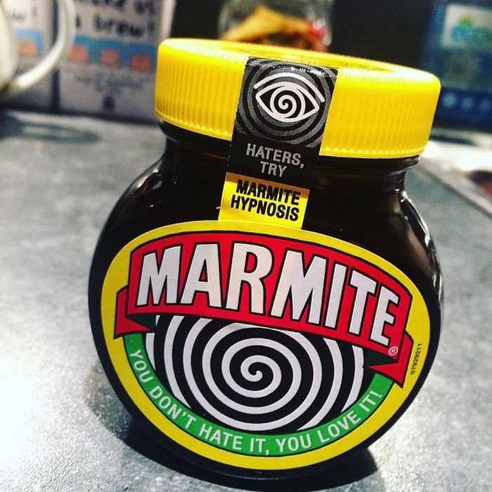 A jar of Marmite with its hynopnotising label
