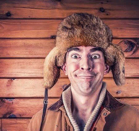 A lunatic wearing a hat