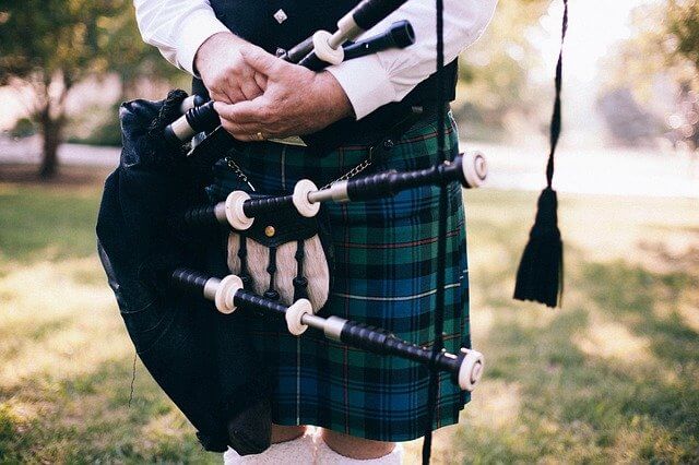 A man wearing a kilt male skirt