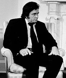 Johnny Cash. "Cash" suggests "money" so here's the link.