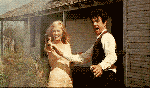 A rather happy Bonnie and Clyde dancing with guns