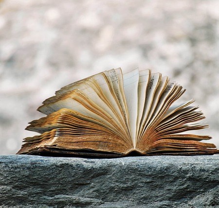 A book on a windowsill