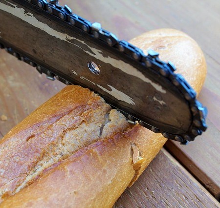 Chainsaw cutting a baguette