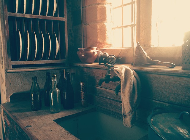 Kitchen and a sink with bottles