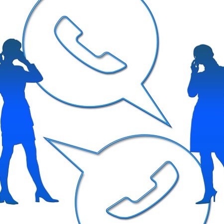 Silhoutte of women on the phone