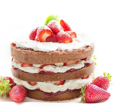 A cake with strawberries
