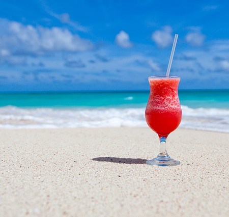 A cocktail on a beach during summer
