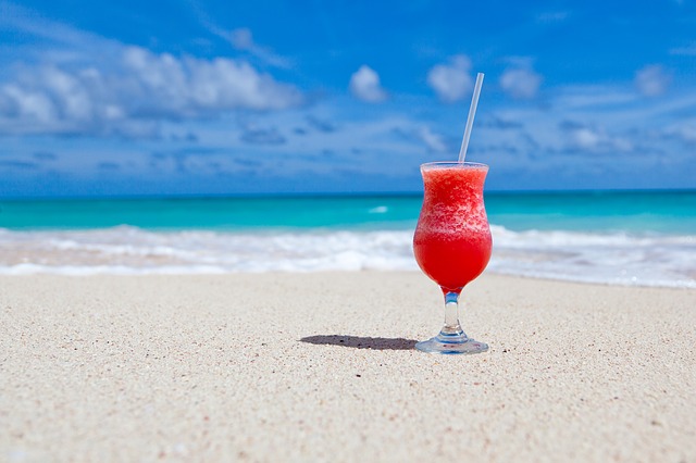 A cocktail on a beach during summer