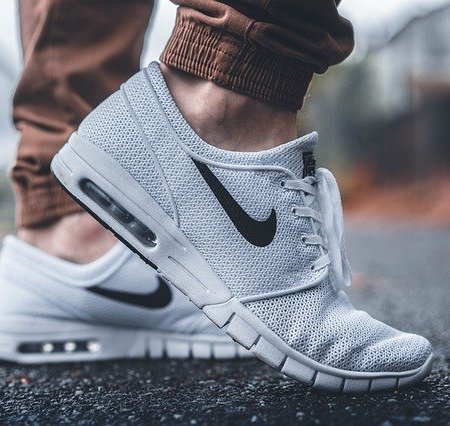 Man feet in trainers