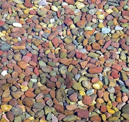 Some skimming stone pebbles under water