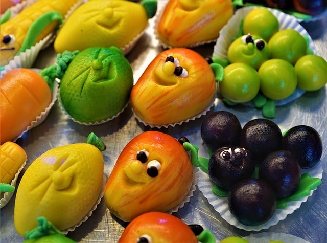 An assortment of fun marzipan shapes for a dessert.