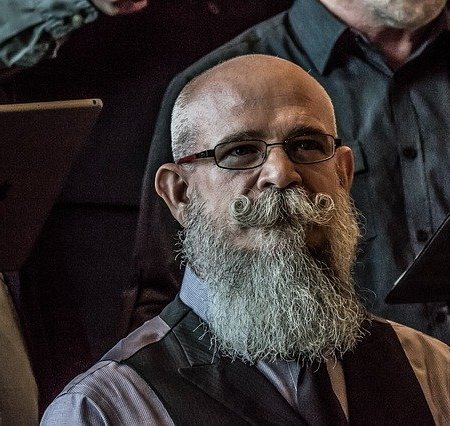 A man with a big bushy beard
