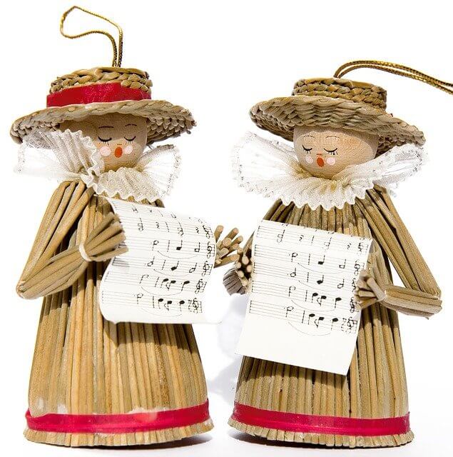 Toy figurines singing Christmas carols