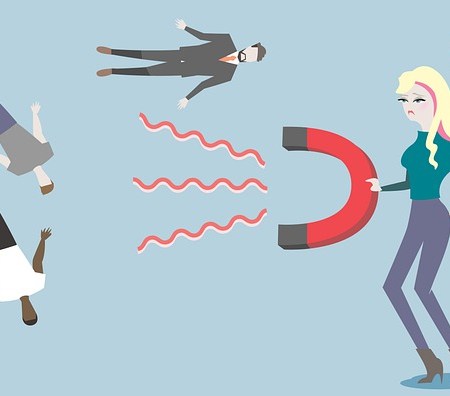 A cartoon woman holding in a magnet to draw in men.
