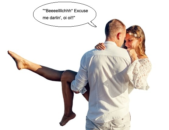 A man holding his girlfriend in a romantic embrace.