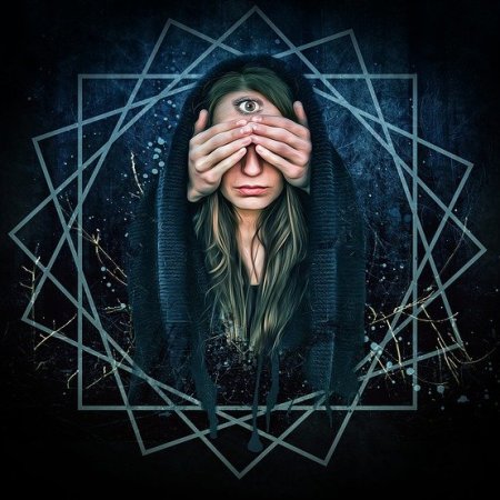 A psychic woman with a third eye, her hands covering her other two