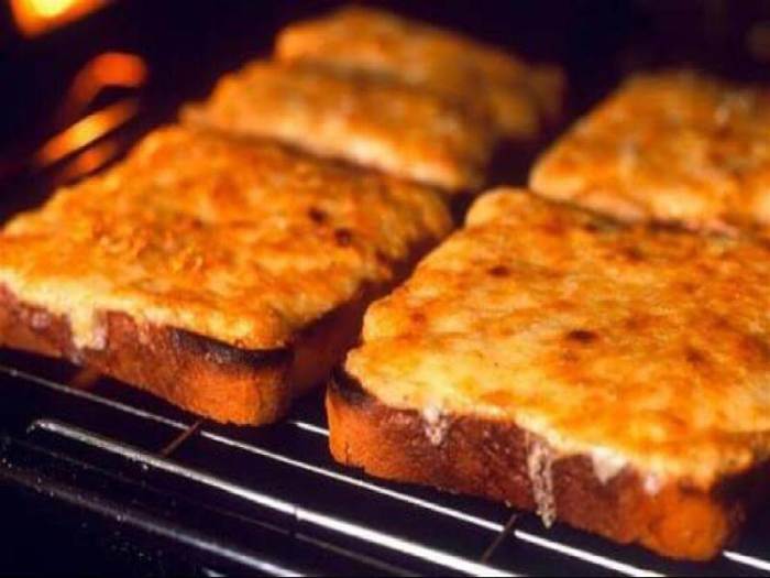Cheese on toast under a grill