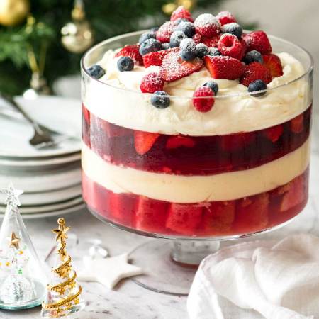 A trifle dessert packed with jelly and whipped cream