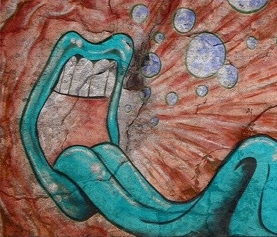 Some graffiti of a mouth drooling