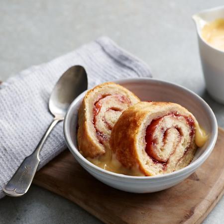 Jam roly-poly served with custard