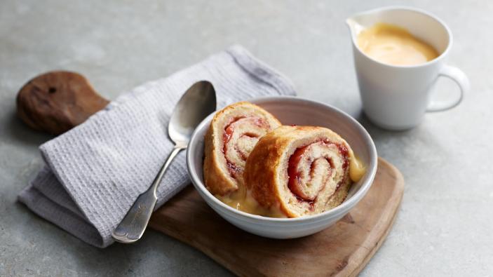 Jam roly-poly served with custard