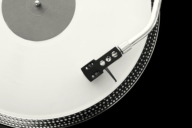 A black and white turntable sound player