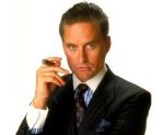 Gordon Gekko holding a cigar