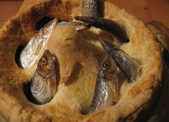 Stargazy pie with fish poking out of the pie crust