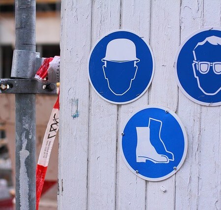 Workplace signs for items you can wear, including shoes