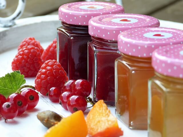 Jam arranged in colourful jars