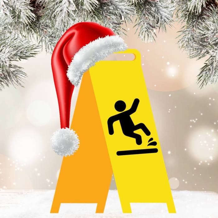 A janitor sign of slipping at Christmas