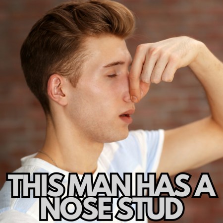 A man holding his nose to hide his nose stud