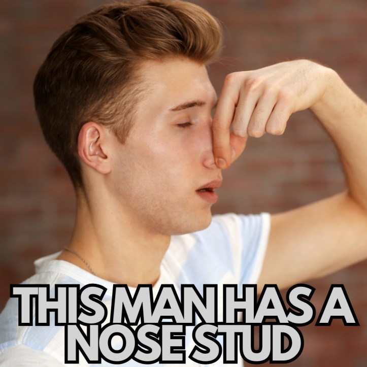 A man holding his nose to hide his nose stud