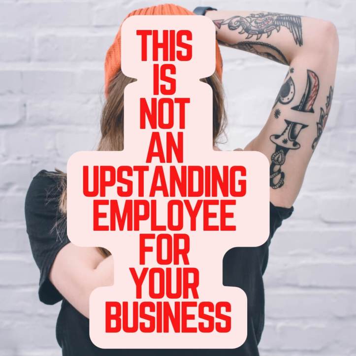 An employee drenched in tattoos posing a threat to capitalism