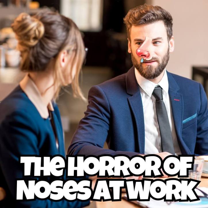 A man with a disgusting nose in the workplace